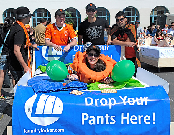 Bed with slogan 'Drop Your Pants Here!'